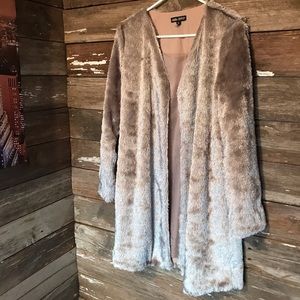 Super pretty, mid thigh length, silver jacket!